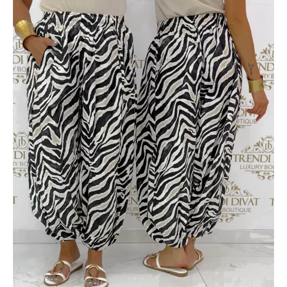 Laza gumis derekú és aljú zebra mintás buggyos nadrág
